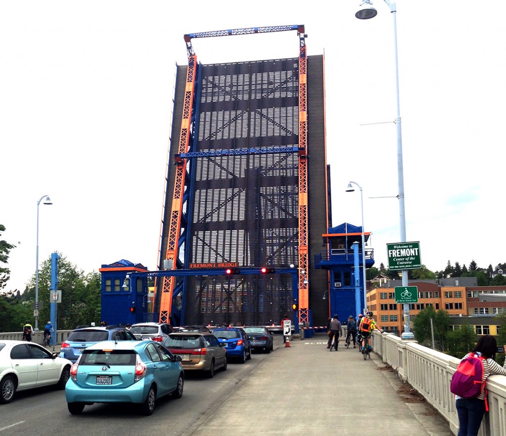 The Freemont Bridge lifts to let a barge pass from the locks to Lake Union