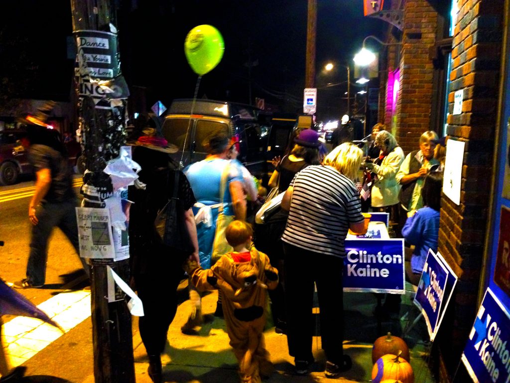A band plays on the street while Democrats canvas to Belle and Scoobie Do - truly an Asheville Halloween